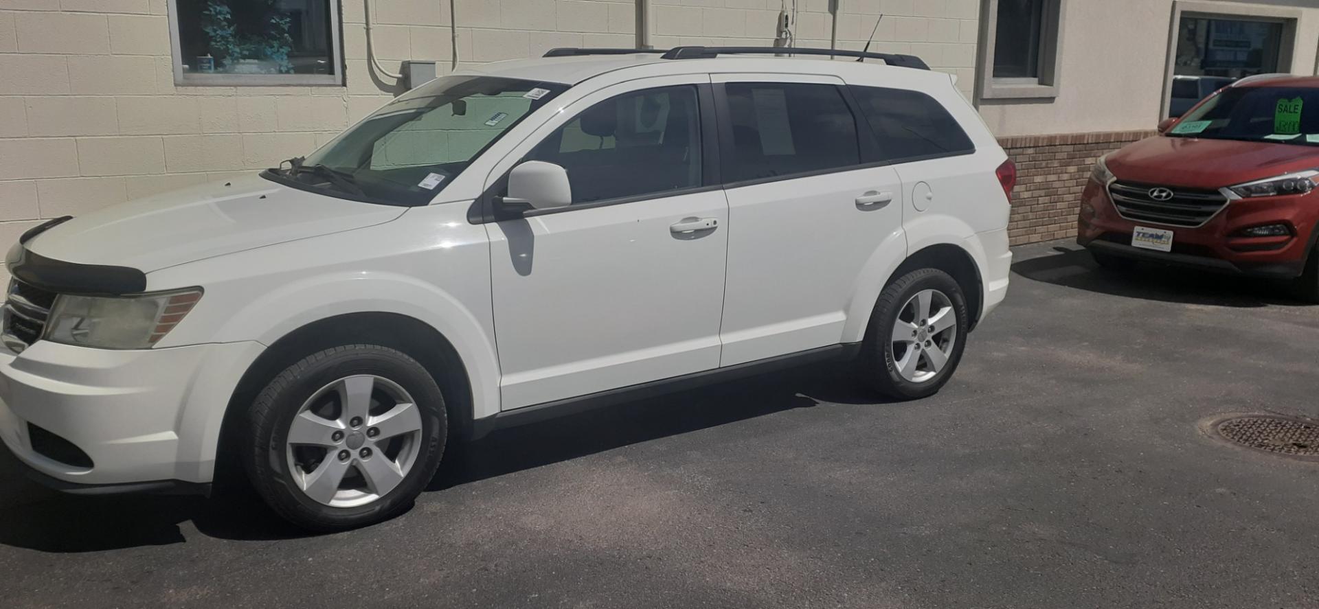 2011 Dodge Journey Mainstreet (3D4PG1FG2BT) with an 3.6L V6 DOHC 24V engine, 6-Speed Automatic transmission, located at 2015 Cambell Street, Rapid City, SD, 57701, (605) 342-8326, 44.066433, -103.191772 - CARFAX AVAILABLE - Photo#1